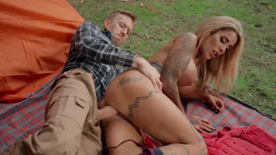 Tattooed Alice Judge having fun during camping